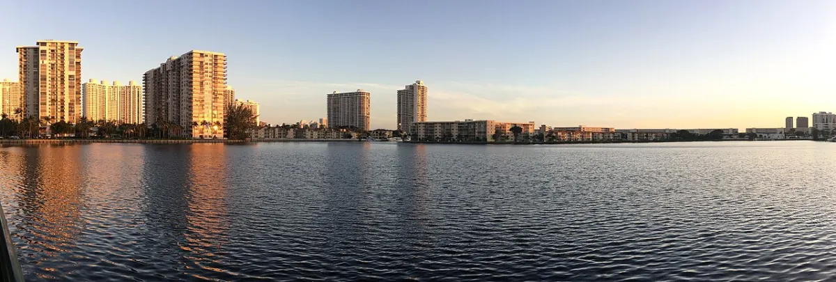 Aventura's condominium towers seen across the water along 183rd Street