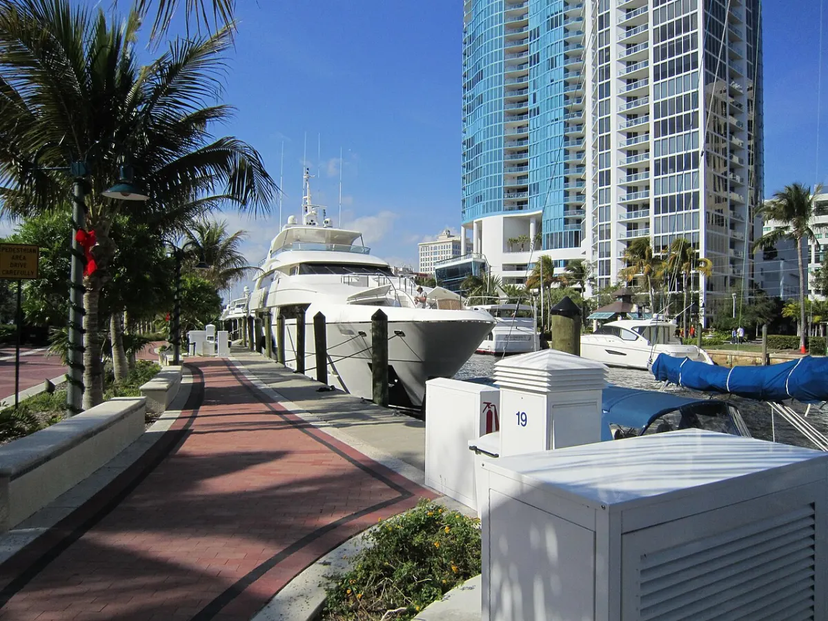 The Riverwalk along the New River in downtown Fort Lauderdale, with towers behind