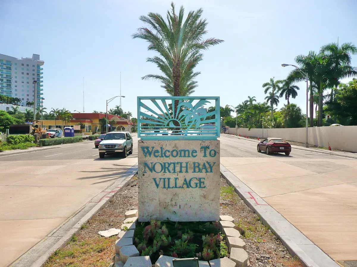 The entrance to North Bay Village on the 79th Street Causeway, with buildings along the road
