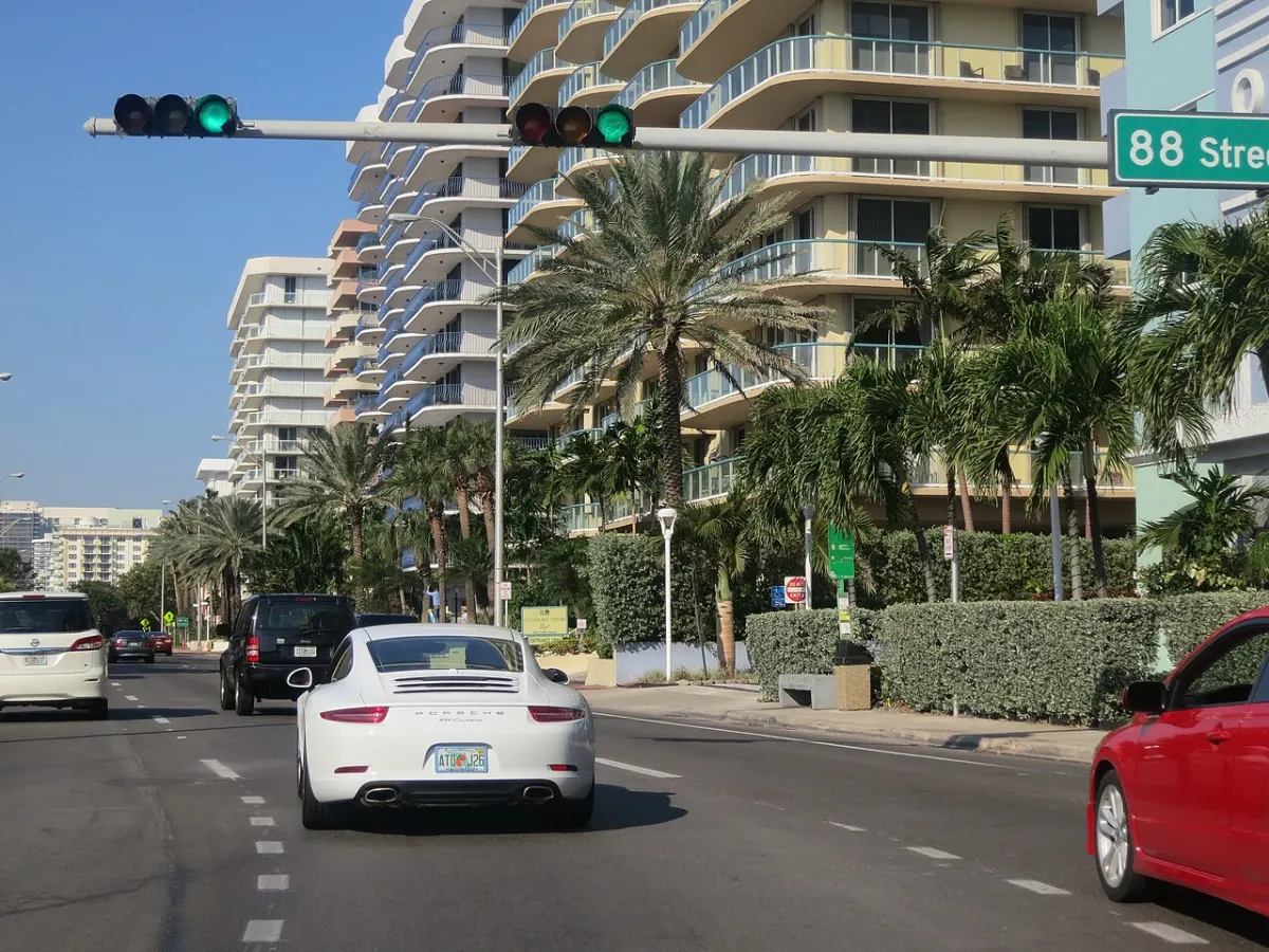Collins Avenue at 88th Street in Surfside, lined with mid-rise condo buildings